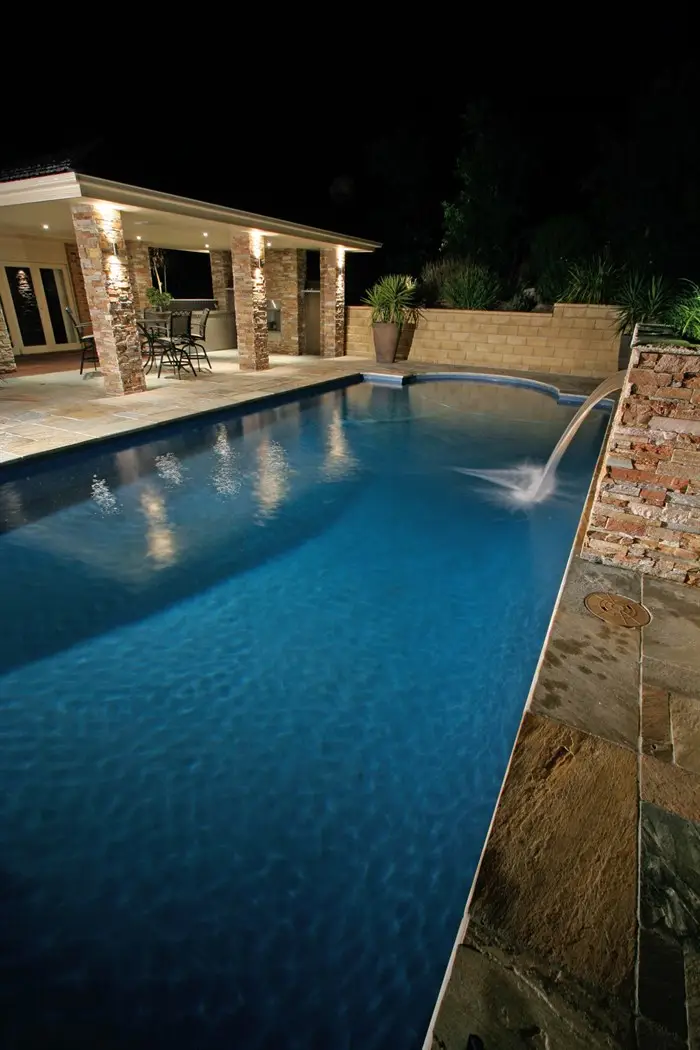 View of pool at night