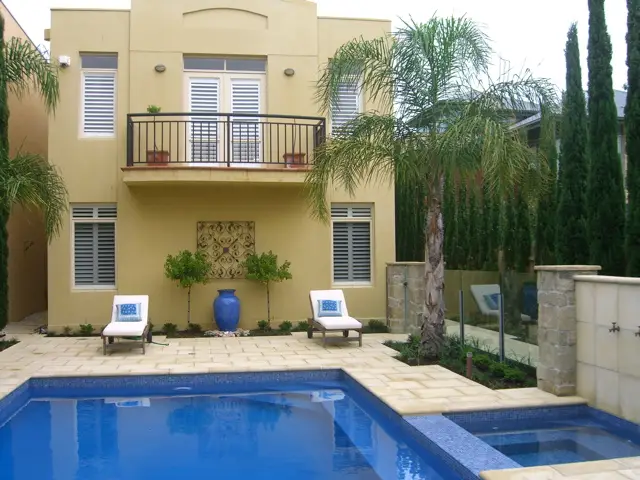 View of Pool and Tuscan inspired house