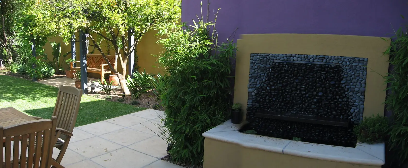 View of waterfeature and pergola