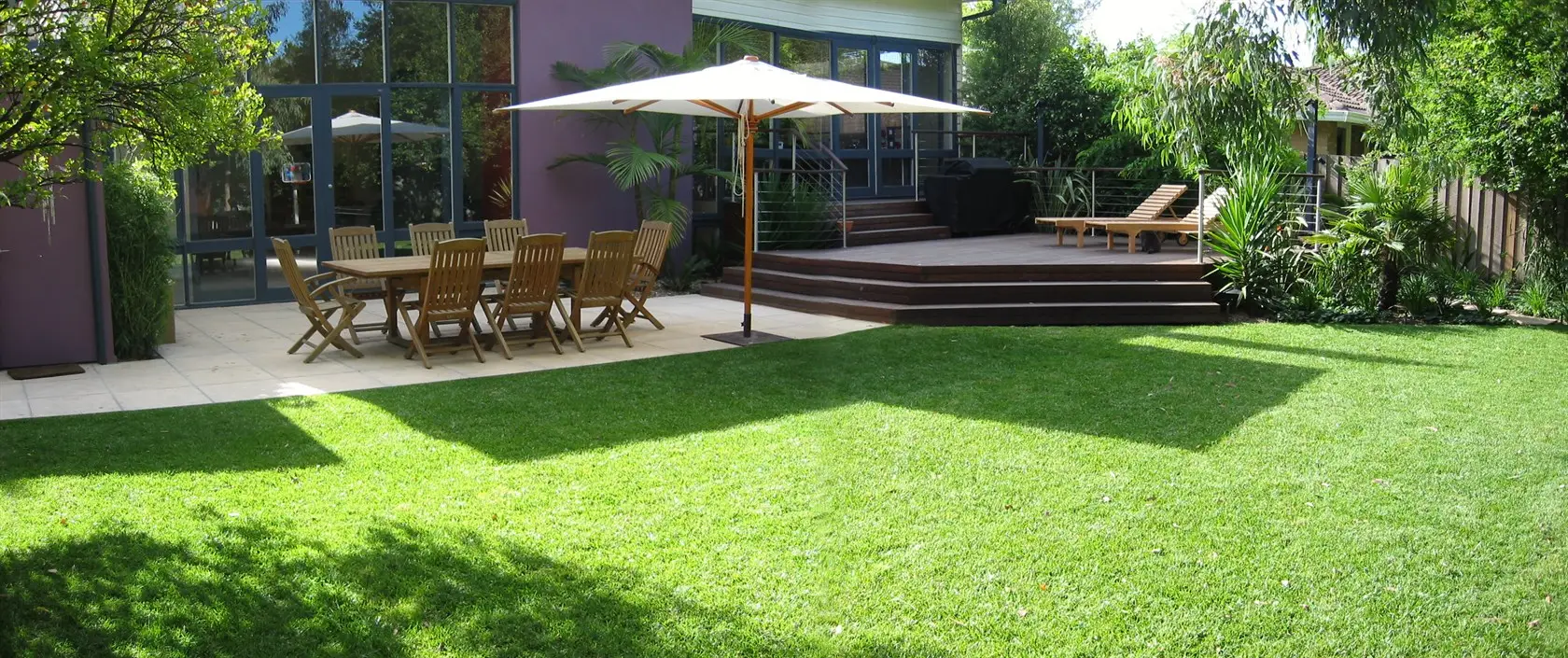 View of deck and Paved outdoor enterrtaining area